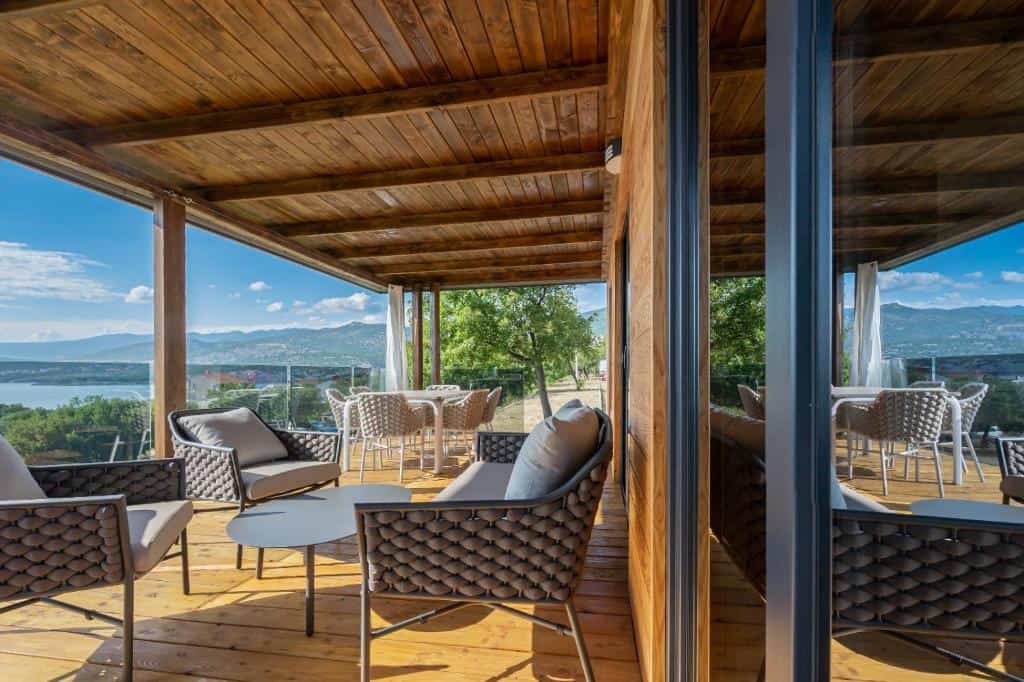 Private wooden terrace with sea view at SparkleTT luxury mobile home in Klenovica, Croatia