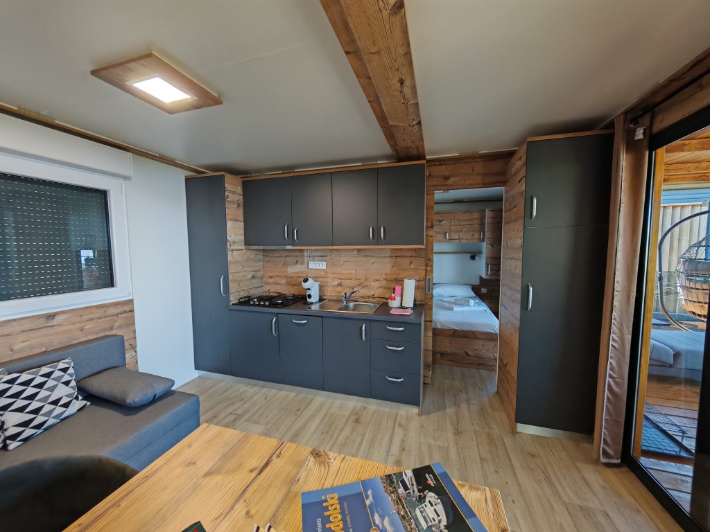 Luxurious interior of SparkleTT mobile home in Klenovica with wooden details and panoramic sea view
