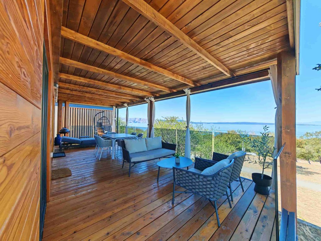Private wooden terrace with sea view at SparkleTT luxury mobile home in Klenovica, Croatia